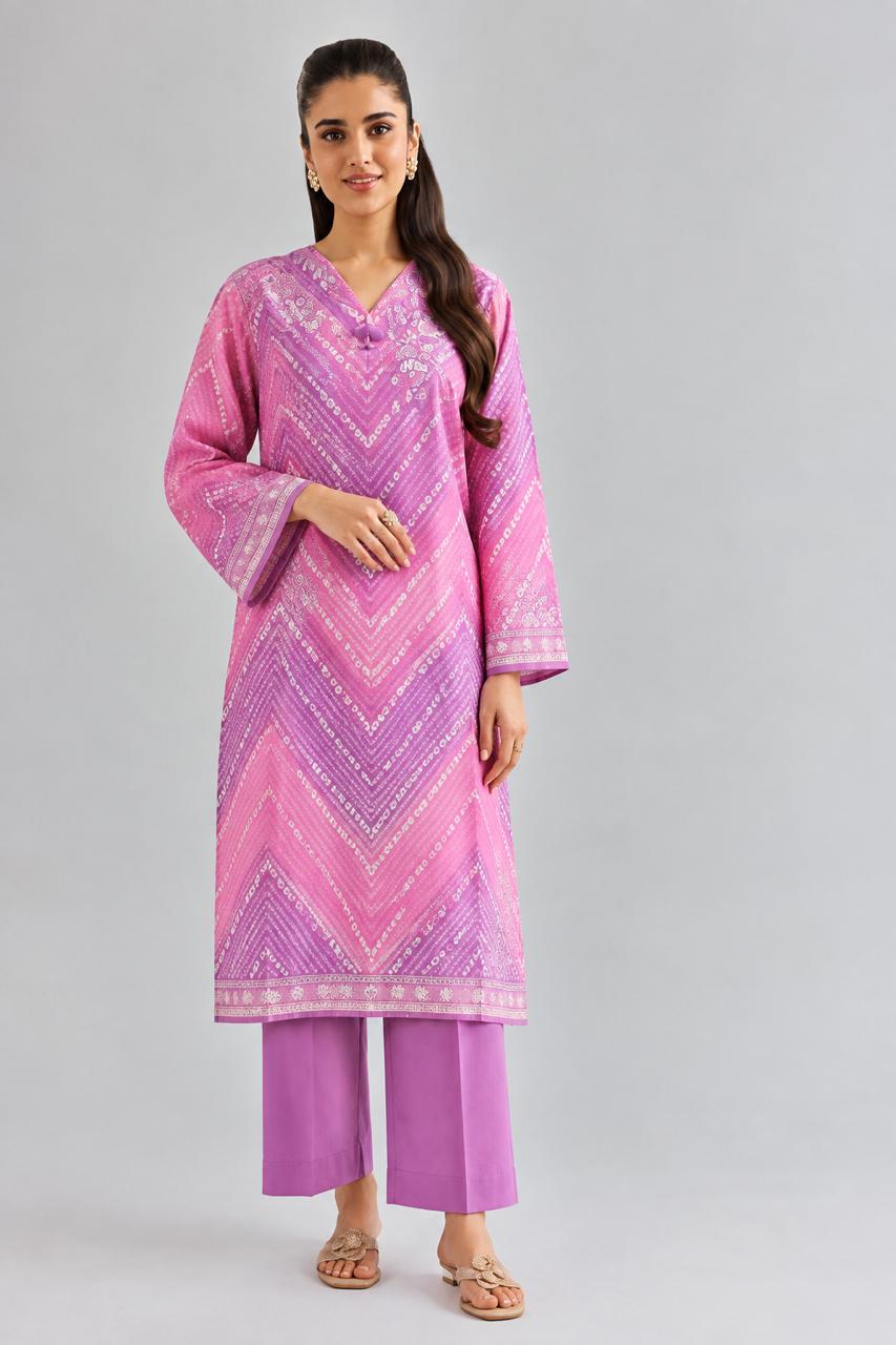 Woman wearing pink and purple digital printed embroidered suit with matching trousers